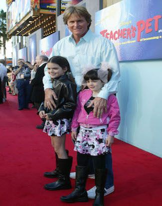 HOLLYWOOD - JANUARY 11: Former Olympian Bruce Jenner and his family attend the film premiere of the"Teacher's Pet" at the El Capitan Theatre on January 11, 2004 in Hollywood, California. The film "Teacher's Pet open in theaters on January 16, 2004. (Photo by Frederick M. Brown/Getty Images).