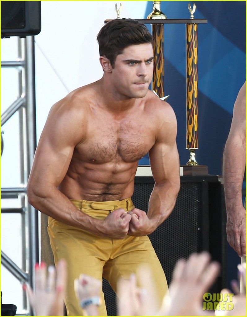51726756 Actors Zac Efron and Robert De Niro take off their shirts for a "Flex Off" contest for a scene in their new movie "Dirty Grandpa" on April 30, 2015 in Tybee Island, Georgia. The new comedy tells the story of an uptight guy who is tricked into driving his grandfather, a perverted former Army general, to Florida for spring break. FameFlynet, Inc - Beverly Hills, CA, USA - +1 (818) 307-4813